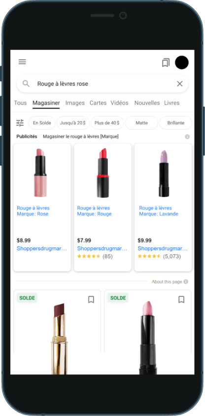 Un écran de téléphone intelligent affiche des publicités de recherche Google pour du rouge à lèvres. 